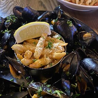 Product: mussels, french fries, white wine cream sauce - SKYBOKX 109 Sports Bar & Grill in Across from the Natick Mall - Natick, MA American Restaurants