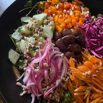 Product: farro and quinoa grain bowl, arugula, pickled
onion, pickled cabbage, cucumber, carrot, bell
pepper, olives, toasted sesame dressing - SKYBOKX 109 Sports Bar & Grill in Across from the Natick Mall - Natick, MA American Restaurants