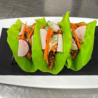 Product: gochujang ground chicken, bibb lettuce, carrot,
radish, scallion, sesame seeds - SKYBOKX 109 Sports Bar & Grill in Across from the Natick Mall - Natick, MA American Restaurants