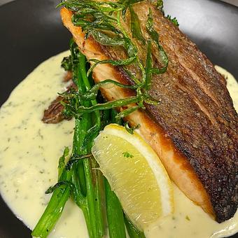 Product: pan-seared salmon fillet, broccolini, fingerlings,
citrus tarragon white sauce - SKYBOKX 109 Sports Bar & Grill in Across from the Natick Mall - Natick, MA American Restaurants