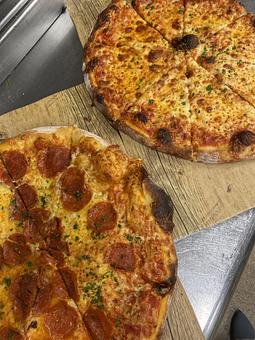 Product: Images shows Pepperoni Pizza and Cheese Pizza - SKYBOKX 109 Sports Bar & Grill in Across from the Natick Mall - Natick, MA American Restaurants