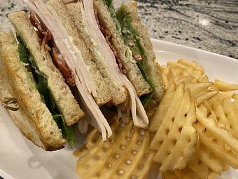 Product: sliced turkey breast, applewood smoked bacon,
romaine, vine ripe tomato, avocado, pesto mayo,
sourdough - SKYBOKX 109 Sports Bar & Grill in Across from the Natick Mall - Natick, MA American Restaurants