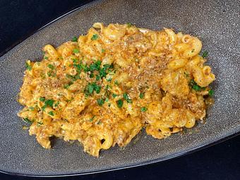 Product: cavatelli pasta, cheddar & american blend,
garlic breadcrumbs - SKYBOKX 109 Sports Bar & Grill in Across from the Natick Mall - Natick, MA American Restaurants