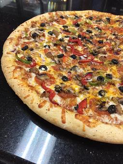 Product: Combination Pizza - Slice of Old Sacramento in Sacramento, CA Pizza Restaurant