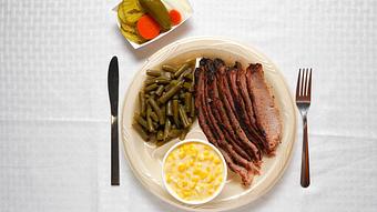 Product: Brisket Plate with Creamed Corn and Green Beans - Smokey Mo’s BBQ in New Braunfels, TX Barbecue Restaurants