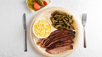 Product: Brisket Plate with Creamed Corn and Green Beans - Smokey Mo’s BBQ in New Braunfels, TX Barbecue Restaurants