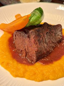 Product: COSTILLA DE TERNERA | short ribs braised in red wine, butternut squashed purée, baby carrot - Socarrat Paella Bar - Chelsea in Chelsea - New York, NY Spanish Restaurants