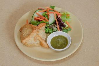 Product: Traditional Samosa filled with curried potatoes and peas. - Spice Restaurant in Truckee, CA American Restaurants Product: Traditional Samosa filled with curried potatoes and peas. - Spice Restaurant in Truckee, CA American Restaurants