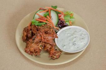 Product: Vegetable Pakora Julienned carrots, zucchini and leeks, mixed in a gluten free batter and fried. - Spice Restaurant in Truckee, CA American Restaurants Product: Vegetable Pakora Julienned carrots, zucchini and leeks, mixed in a gluten free batter and fried. - Spice Restaurant in Truckee, CA American Restaurants