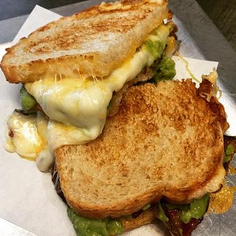 Product: The Grilled cheese with "The Business", avocado - tomatoes - bacon, so so good! - Spread in Downtown Campbell - San Jose, CA American Restaurants