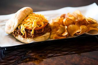 Product: Homemade Pulled Pork with hand cut in house Potato Chips - Springvale Publick House in Springvale, ME American Restaurants Product: Homemade Pulled Pork with hand cut in house Potato Chips - Springvale Publick House in Springvale, ME American Restaurants