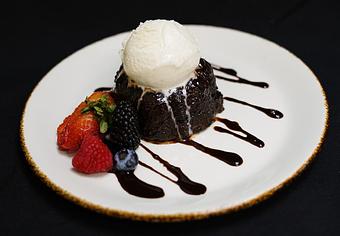 Product: Chocolate Lava Cake
Warm cake with melted dark chocolate truffle, served with Vanilla bean gelato - Stables Ranch Grille - Restaurant-Reservations in Tubac, AZ American Restaurants