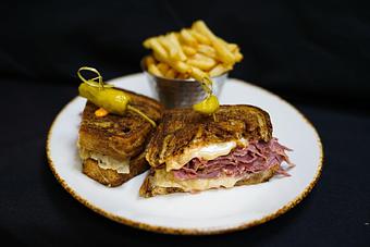 Product: Reuben
Thin sliced corned beef, sauerkraut, Jarlsberg  swiss, thousand island 
dressing on caraway rye - Stables Ranch Grille - Restaurant-Reservations in Tubac, AZ American Restaurants
