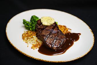 Product: Grilled 10 oz NY
Tarragon mustard butter, sautéed broccolini, and hash browned potatoes - Stables Ranch Grille - Restaurant-Reservations in Tubac, AZ American Restaurants