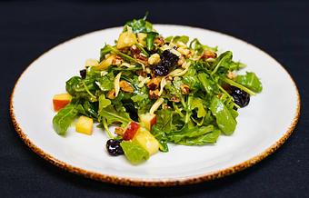 Product: Arugula
Fuji apple, dried tart cherries, candied local pecans, manchego cheese, balsamic vinaigrette - Stables Ranch Grille - Restaurant-Reservations in Tubac, AZ American Restaurants