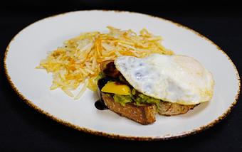 Product: Avocado Toast
Artisan bread, one egg any style, avocado, sea salt, heirloom tomatoes, and balsamic drizzle - Stables Ranch Grille - Restaurant-Reservations in Tubac, AZ American Restaurants