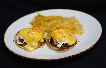Product: Classic Eggs Benedict
Two poached eggs on top of smoked ham and english muffins, topped with hollandaise sauce - Stables Ranch Grille - Restaurant-Reservations in Tubac, AZ American Restaurants