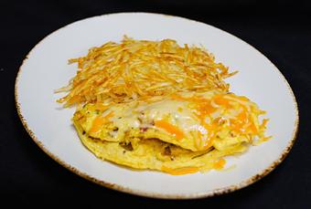 Product: Tubac
Sautéed medley of peppers, 
smoked ham, onion, manchego and Tillamook cheddar - Stables Ranch Grille - Restaurant-Reservations in Tubac, AZ American Restaurants