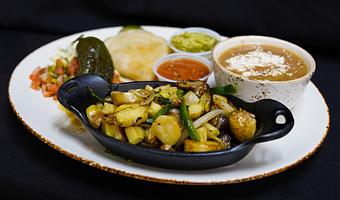 Product: Vegetable Rajas
Grilled chayote squash, sunchoke-fingerling hash, jicama, barbacoa salsa and tomatillo guacamole - Stables Ranch Grille - Restaurant-Reservations in Tubac, AZ American Restaurants