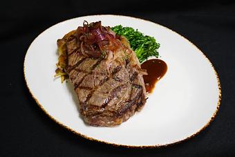 Product: Grilled 12 oz Rib Eye
Cabernet demi-glace, gastrique onions, crispy fingerlings, and broccolini - Stables Ranch Grille - Restaurant-Reservations in Tubac, AZ American Restaurants