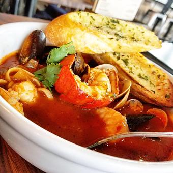 Product: Cioppino (Lobster, prawns, mussels and clams & noodles in spicy garlic tomato wine sauce) - Station 16 in Sacramento, CA Bars & Grills