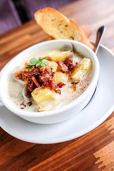 Product: Clam Chowder (Manila clams, bacon, potatoes, carrots and celery) - Station 16 in Sacramento, CA Bars & Grills