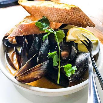Product: Mussel Steamer (Pei mussels in a Cajun garlic butter broth. Served with toasted baguette) - Station 16 in Sacramento, CA Bars & Grills