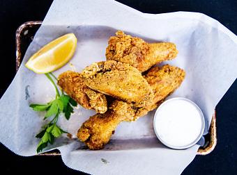 Product: Wings (Sweet chili, Buffalo or lemon pepper) - Station 16 in Sacramento, CA Bars & Grills