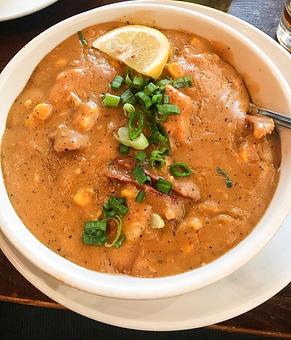 Product: Shrimp & Grits (Prawns, Cajun sausages, corn and grit) - Station 16 in Sacramento, CA Bars & Grills