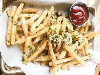 Product: Cajun Garlic Fries (Seasoned with Cajun garlic and olive oil) - Station 16 in Sacramento, CA Bars & Grills