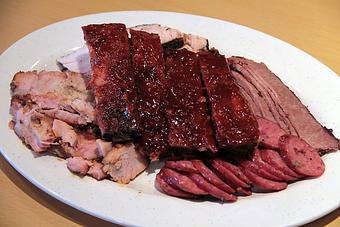 Product: pork ribs - brisket - sausage - chopped beef - Stockyard Bar-B-Q in Houston - Houston, TX Barbecue Restaurants