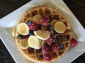 Product: Yeasted waffle topped with fresh fruit - Studio 2 in Minneapolis, MN American Restaurants