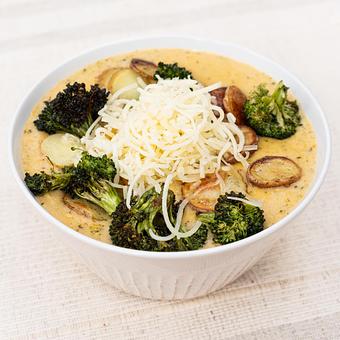 Product: Broccoli Cheese with roasted fingerling potatoes, point reyes toma, and served with a buttermilk biscuit - Summer House Santa Monica in Lincoln Park - Chicago, IL American Restaurants