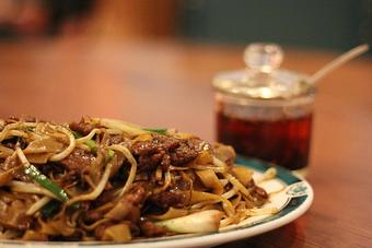 Product: One of our more popular dishes.  Beef Chow Fun has beef, green onions, been sprouts, and thick noodles stir fried together.  Incredible with hot oil. - Sun Hong Kong Restaurant in Downtown Kingsburg - Kingsburg, CA Chinese Restaurants