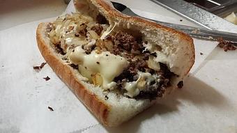 Product: Grilled Rib-eye Steak, White American cheese, On a toasted Steak Roll. This is 12 oz Rib-Eye Steak seasoned and Grilled to perfection. It does not need too many toppings. Prepared Meat Cheese and Bread... - Surfwiches Sandwich Shop in Jacksonville Beach - Jacksonville Beach, FL American Restaurants