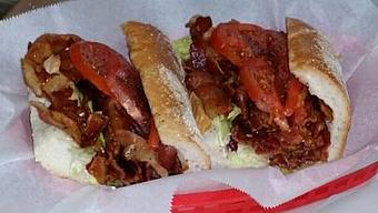 Product: A Mountain of Apple-wood Smoked bacon, red ripe local tomato's, crispy lettuce with our Homemade Garlic Peppercorn Mayonnaise Served on a Hoagie roll - Surfwiches Sandwich Shop in Jacksonville Beach - Jacksonville Beach, FL American Restaurants