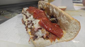 Product: Rib-eye or Chicken, seasoned and seared, Marinara sauce, Pepperoni and melted Provolone & Romano cheeses on a toasted steak roll - Surfwiches Sandwich Shop in Jacksonville Beach - Jacksonville Beach, FL American Restaurants