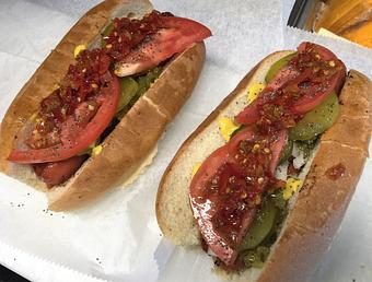 Product: All Beef Frank on hot dog roll Mustard, relish, raw onion, tomato, hot peppers & pickles sprinkled with Poppy Seeds - Surfwiches Sandwich Shop in Jacksonville Beach - Jacksonville Beach, FL American Restaurants