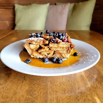 Product: French Toast Bread Pudding with cinnamon, banana, candied pecans, butter, and pure maple syrup. - The Acre in Albuquerque, NM American Restaurants