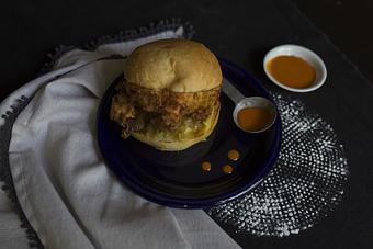 Product: pickle slaw, caramelized onion aioli, choice of spicy or Southern-style chicken - The Asbury in Uptown Charlotte - Charlotte, NC American Restaurants