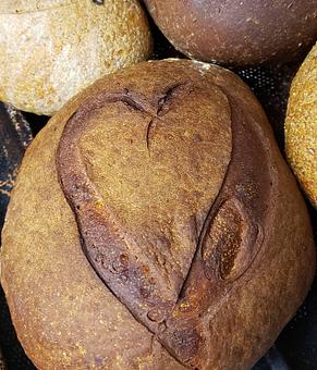 Product: One of our unique breads!  This one is Potato Garlic and you can tell we love it!  Made with only 6 ingredients!  Potatos, Flour, yeast, olive oil, garlic, and salt.  As with all of our baked goods, this is baked fresh every day. - The Back Door Bakery & Cafe in Sunland, CA American Restaurants