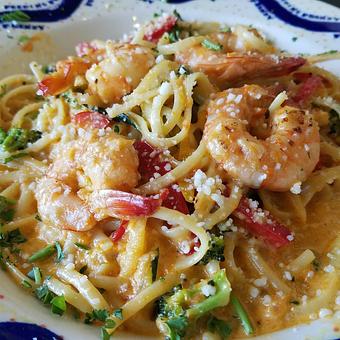Product: A delicious sauteed veggie pasta in a creamy pink sauce.  Wilc caught Shrimp added upon request. - The Back Door Bakery & Cafe in Sunland, CA American Restaurants