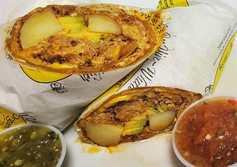 Product: 3 organic cage free eggs, 4 oz drained beef chorizo, applewood smoked bacon thick cut, sour cream, jalapeno pepper jack & cheddar cheeses, half an avocado, sour cream, our famous no oil red potatoes!  side of homemade salsa. - The Bee Hive in Whittier, CA Delicatessen Restaurants