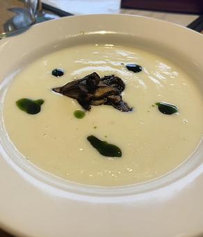 Product: Creamy cauliflower soup topped with crispy mushrooms - The Bowman in Parkville, MD American Restaurants