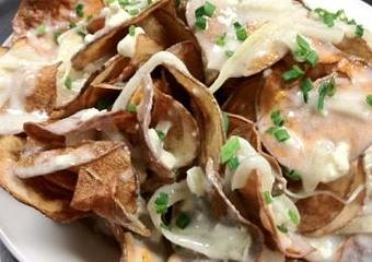 Product: House-made Potato Chips Drizzled with Caramelized Onions and Bleu Cheese - The Caboose Restaurant in Located in Beautiful Downtown McComb - McComb, MS Cajun & Creole Restaurant