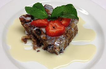 Product: Our Famous Bread Pudding with Rum Sauce - The Caboose Restaurant in Located in Beautiful Downtown McComb - McComb, MS Cajun & Creole Restaurant