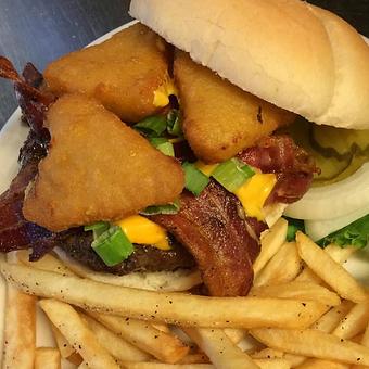 Product: Mac & Cheese Burger with cheese sauce, bacon bits, chives and macaroni bites - The Concord Grill in Affton - Saint Louis, MO American Restaurants