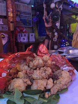 Product: This plate consists of two Maine lobster tails - The Fish House in Miami, FL Seafood Restaurants