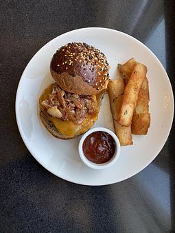 Product: The Hackney Housemade Burger with Housemade Sesame Seed Brioche Bun - The Hackney in Washington, NC Bars & Grills