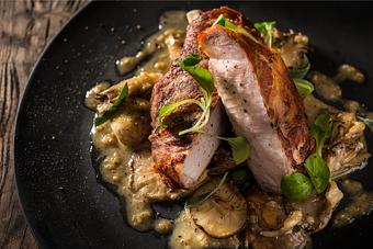 Product: Prosciutto Wrapped Berkshire Pork Chop Mushrooms, Sage, White Wine Sauce - The Inn at Pound Ridge in Pound Ridge, NY American Restaurants